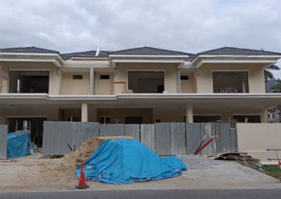 Double-Storey Semi-Detached Houses (Front View) – Tiling works are in progress
